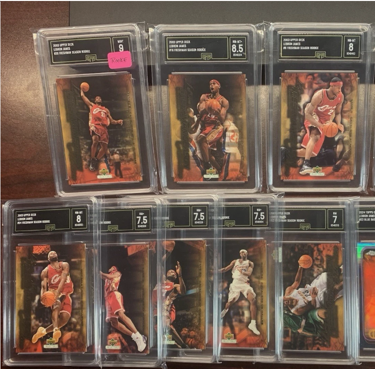 2003-04 Lebron James - NBA Basketball RC Rookie Year Card REPACK - 1x Sports Card Single (Graded 7 , Various Grading Companies, Randomly Selected, Stock Photo - May Not Get Cards In Picture, Used as an Example Only)